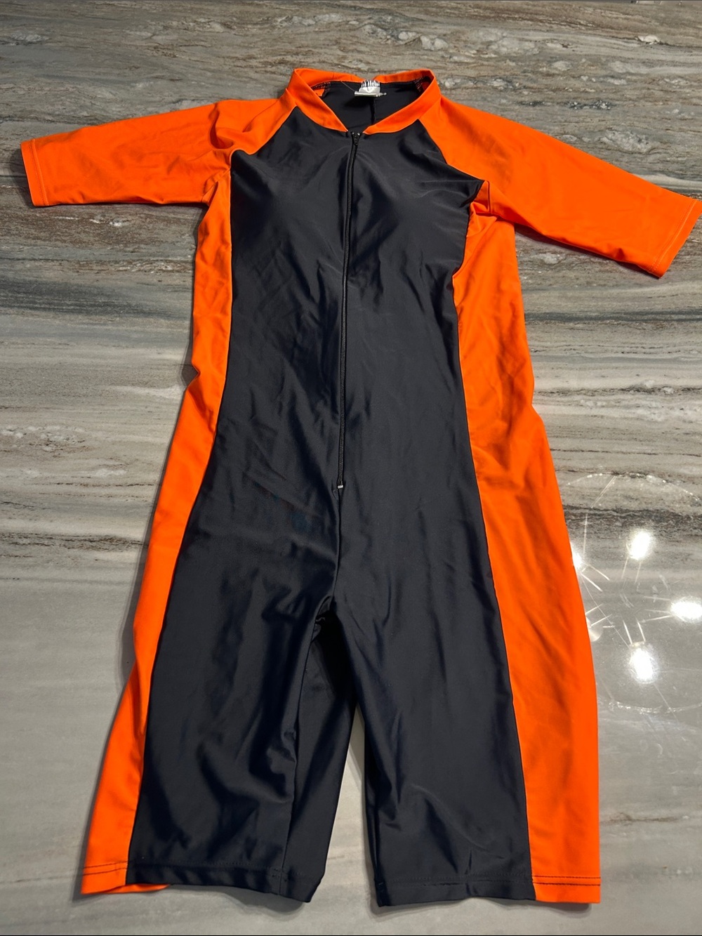 NWOT S8ART Black and Bright Orange Short Sleeve Zip Front Swim Jumpsuit retro L